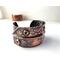Copper fold formed textured cuff bracelet w/tactile braille "I am enough" in Contracted Braille. Antiqued, burnished, and polished.